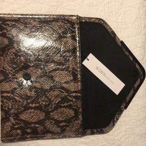 Snake skin clutch bag